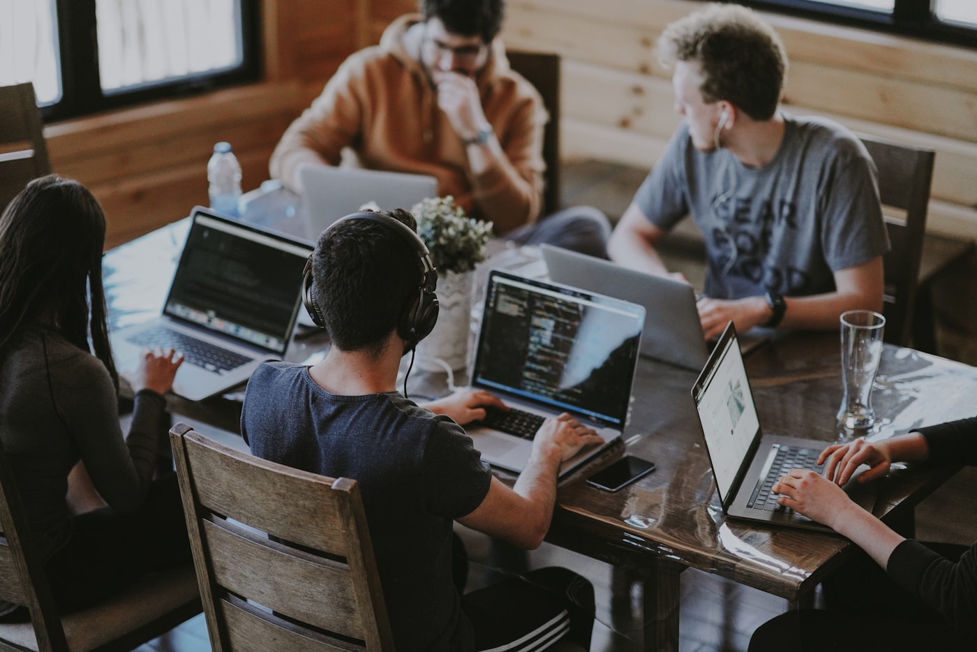TECHLY team reviewing data charts